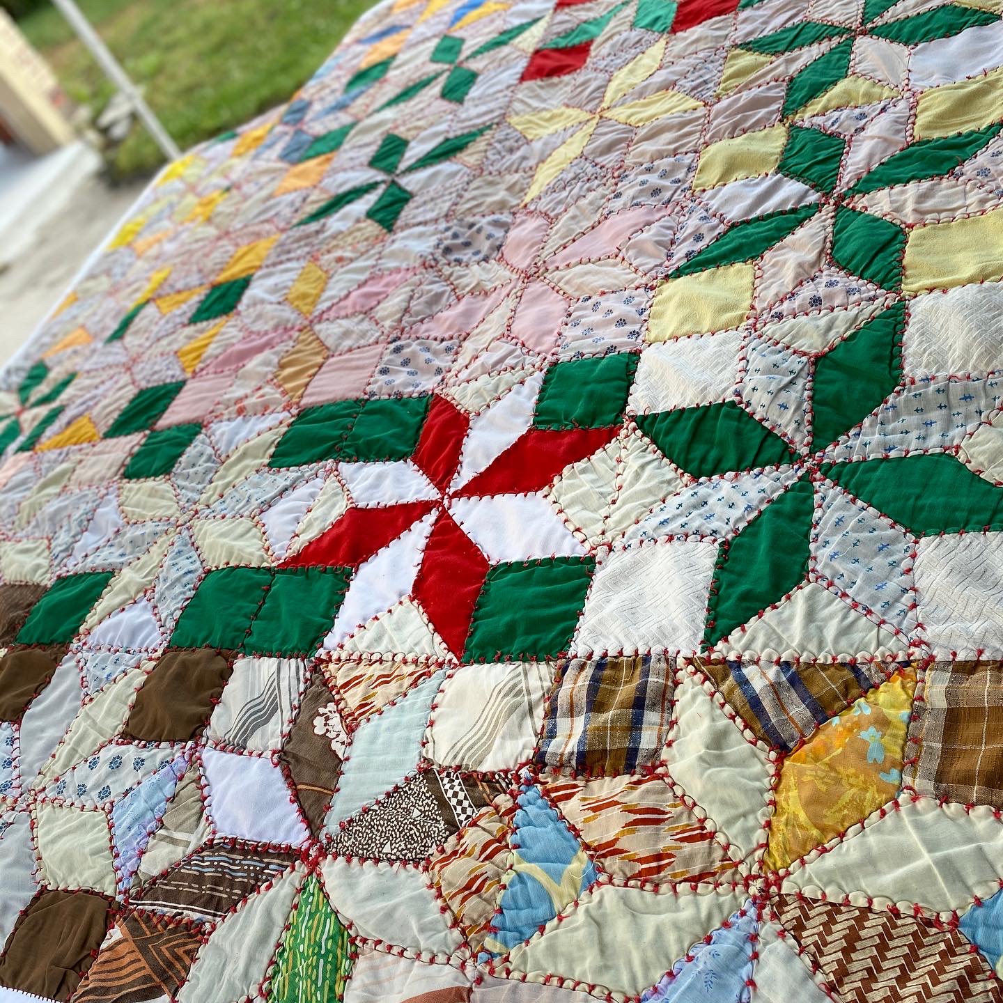 Same quilt after restoration — stabilized and renewed
